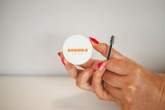 Hand holding a Browde eyebrow fixation - Luna Beauty Supplies