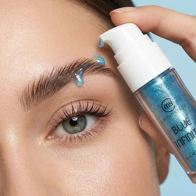 My Lamination Blue Infinity Serum being applied to a model's eyebrows, showing the shimmering blue texture.