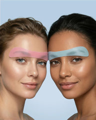 Two models wearing My Lamination reusable silicone brow covers in pink and light blue during a professional brow lamination treatment.
