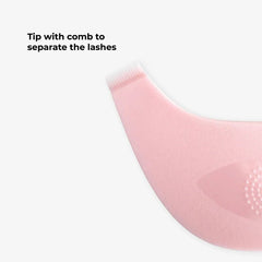 Pink eyelash comb with text 'Tip with comb to separate the lashes' on a white background